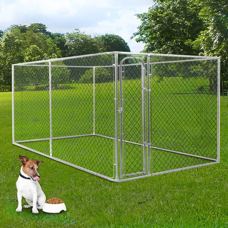 A chain link dog kennel with dark green cover on white background.