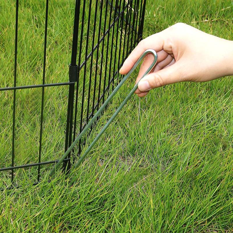A hand is fastening the exercise pens with drop pin.
